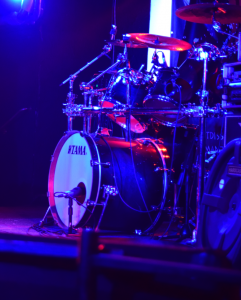 Microphoned drum set in a club