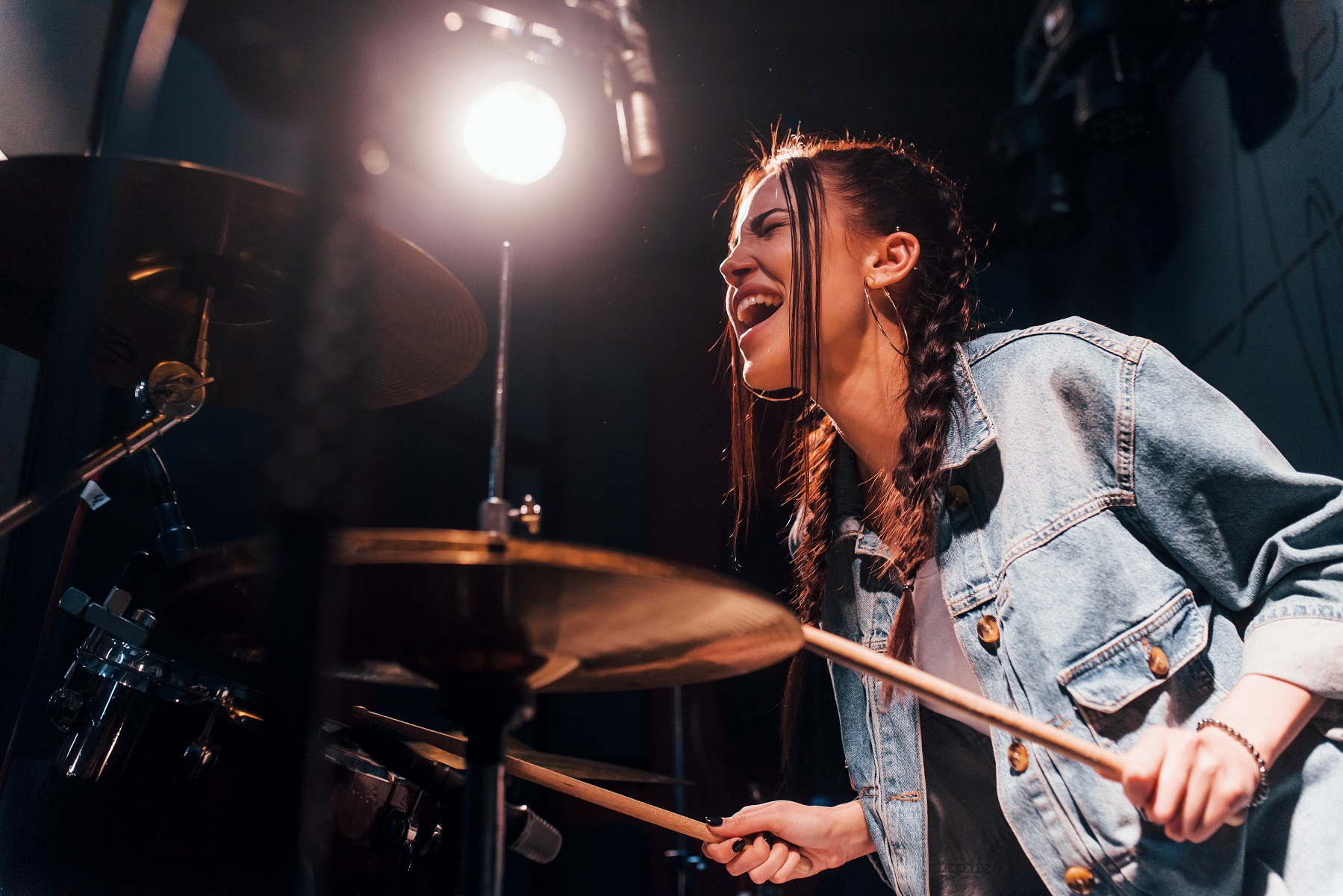 Woman playing drums