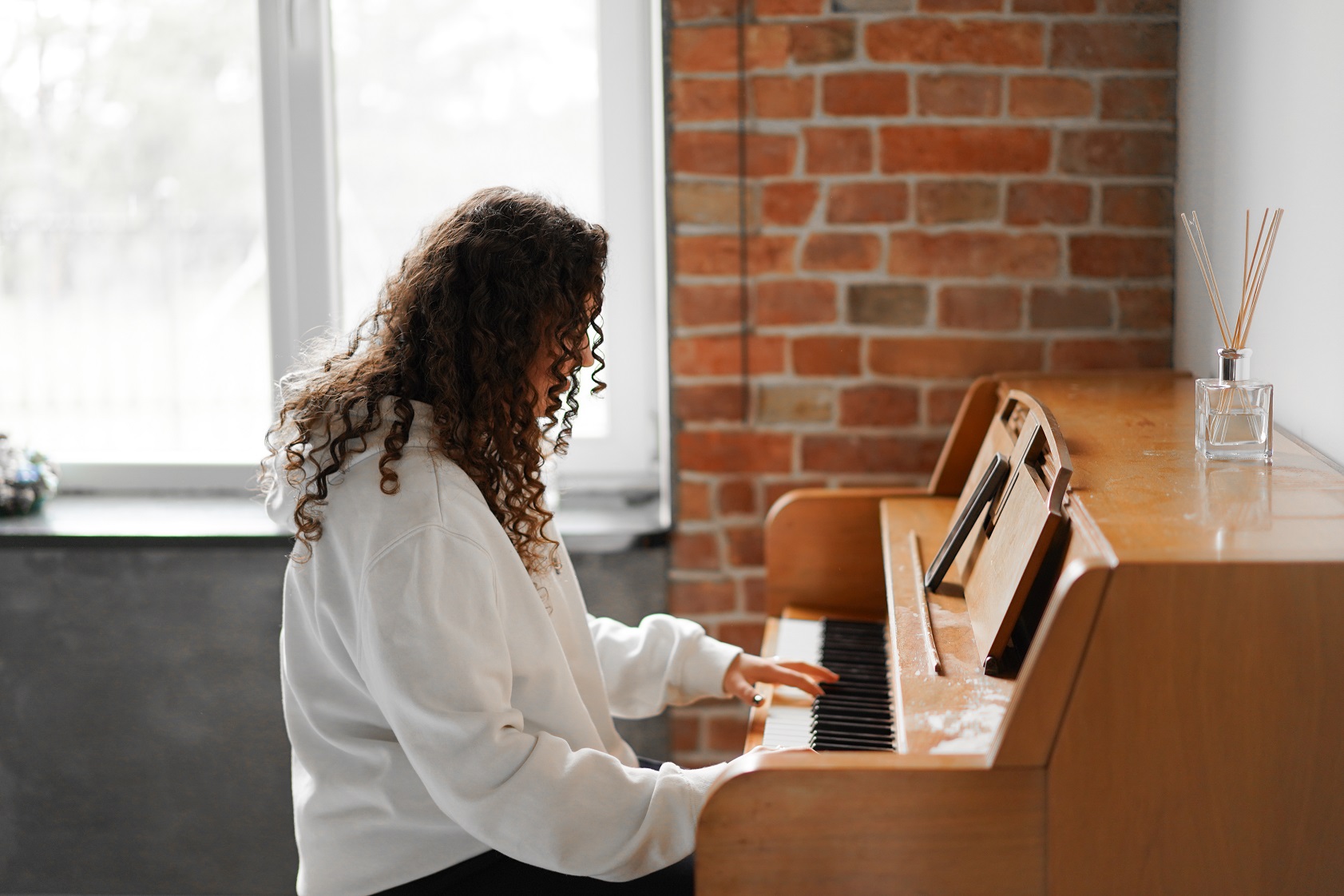 A woman playing piano